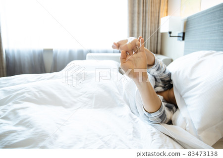 Lazy woman wake up late. Lazy woman wake up late. 83473138