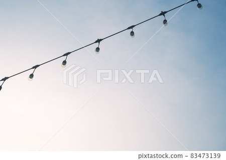 Vintage light bulb in beautiful sky. Vintage light bulb in beautiful sky. 83473139