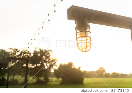 Vintage light bulb in beautiful sky. Vintage light bulb in beautiful sky. 83473140