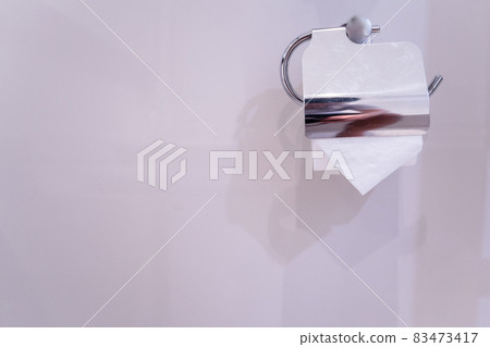 Tissue paper in toilet. 83473417