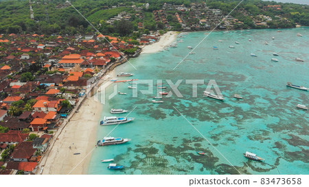 Coast Jungut Batu village with boats on the island of Lembongan. Indonesia. Aerial view. 83473658