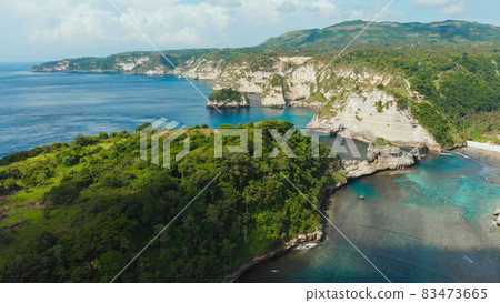 Aerial view of the small island of Nusa Penida Island from the Atuh Rija Lima shrine on Nusa Penida Island near Bali, Indonesia. Nusa Penida island aerial view beach from drone. 83473665