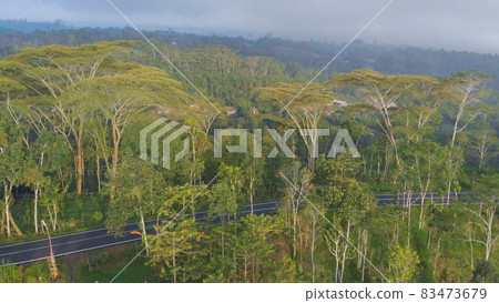 Aerial landscapes of Indonesian fields, hills and villages on the island of Bali. Aerial landscapes of Indonesian fields, hills and villages on the island of Bali. 83473679