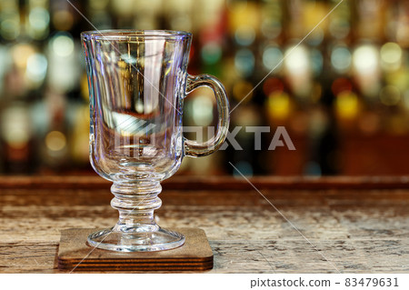 Clean glass for mulled wine on the bar Clean glass for mulled wine on the bar 83479631