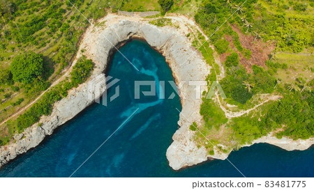 Aerial view of the small island of Nusa Penida Island from the Atuh Rija Lima shrine on Nusa Penida Island near Bali, Indonesia.Nusa Penida island aerial view beach from drone. Travel Indoneesia. 83481775