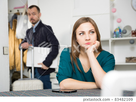 Wife offended husband because of business trip Wife offended husband because of business trip 83482109