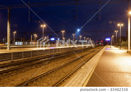 KOUVOLA, FINLAND - NOVEMBER 8, 2018: Railway station at night. KOUVOLA, FINLAND - NOVEMBER 8, 2018: Railway station at night. 83482338