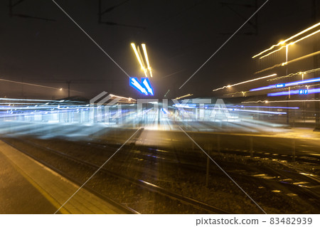Abstract night scene of Kouvola railway station in zoom blur effect. 83482939