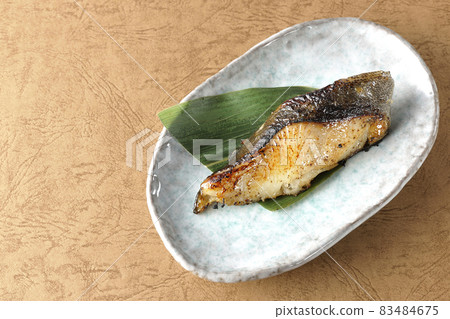 A bird's-eye view of the grilled sablefish, which looks delicious with fat on it. A bird's-eye view of the grilled sablefish, which looks delicious with fat on it. 83484675