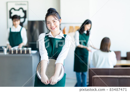 Young lady of cafe staff Young lady of cafe staff 83487471