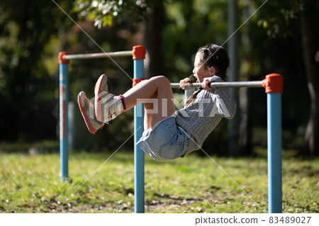 Child practicing upside-down 83489027