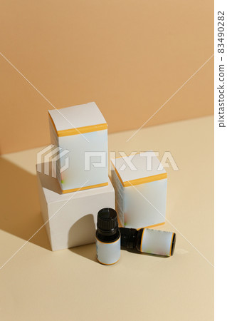 Set of cosmetic glass bottle. Closeup, copyspace. Beauty blogging, salon treatment concept, minimalism brand packaging mock up Set of cosmetic glass bottle. Closeup, copyspace. Beauty blogging, salon treatment concept, minimalism brand packaging mock up 83490282
