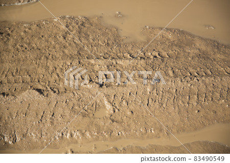 texture and background of dirt in the village after the rain 83490549