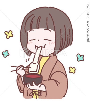 A woman eating rice cakes happily on New Year's Day A woman eating rice cakes happily on New Year's Day 83490751