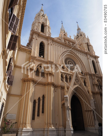 Front of sacred heart churchh in Malaga in Spain - vertical 83490785