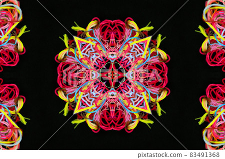 Abstract pattern of multicolored threads on a black background Abstract pattern of multicolored threads on a black background 83491368