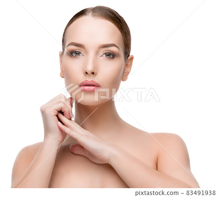Beautiful Young Woman with Clean Fresh Skin isolated on white background Beautiful Young Woman with Clean Fresh Skin isolated on white background 83491938