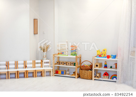 Montessori material, Kindergarten Preschool Classroom Interior, wooden furniture and toys, didactic materials 83492254