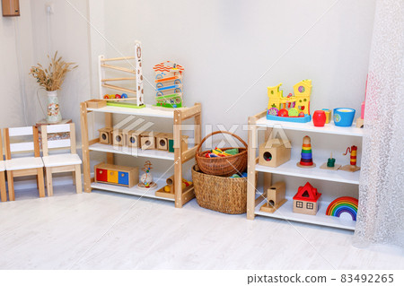 Montessori material, Kindergarten Preschool Classroom Interior, wooden furniture and toys, didactic materials 83492265
