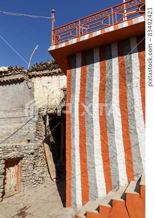Striped house wall, Kagbeni, Nepal 83492421