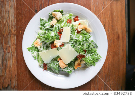 caesar salad or vegetable salad with bacon caesar salad or vegetable salad with bacon 83492788