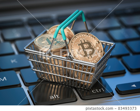 Bitcoin coins in shopping basket on laptop keyboard. Bitcoin wallet and payment. 83493373