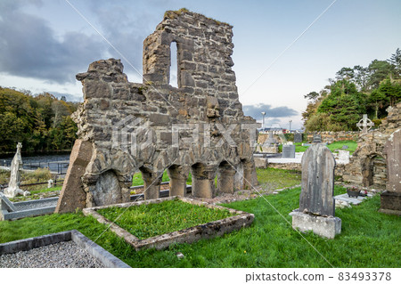 The sun is setting above the Abbey Graveyard which was build by Hugh O Donnell in 1474 - all names and artwork removed 83493378