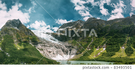 Jostedalsbreen National Park, Sogn Og Fjordane County, Norway. Boyabreen Glacier Landscape In Spring Sunny Day. Famous Norwegian Landmark And Popular Destination. Panorama, Panoramic View Jostedalsbreen National Park, Sogn Og Fjordane County, Norway. Boyabreen Glacier Landscape In Spring Sunny Day. Famous Norwegian Landmark And Popular Destination. Panorama, Panoramic View 83493501
