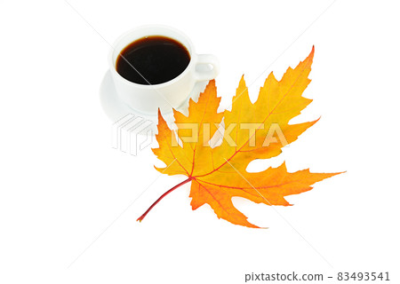 Cup of coffee and yellow maple leaf isolated on white . Cup of coffee and yellow maple leaf isolated on white . 83493541