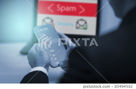 Email concept with laptop spam and virus computer monitor internet security concept, businessman reading electronic mail with a laptop. Spam, junk and e-marketing on screen, Spam Email Pop-up Warning. Email concept with laptop spam and virus computer monitor internet security concept, businessman reading electronic mail with a laptop. Spam, junk and e-marketing on screen, Spam Email Pop-up Warning. 83494582