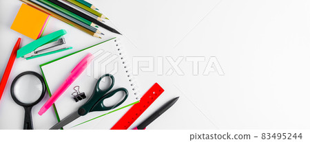 A set of office supplies on a white background. Back to school concept. Place for text. Banner format A set of office supplies on a white background. Back to school concept. Place for text. Banner format 83495244