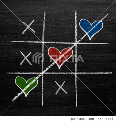 Tic tac toe game with chalk hearts, XO noughts and crosses Valentine's Day style Tic tac toe game with chalk hearts, XO noughts and crosses Valentine's Day style 83495551