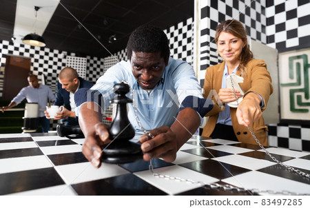 Four friends looking for way out of chess quest room 83497285