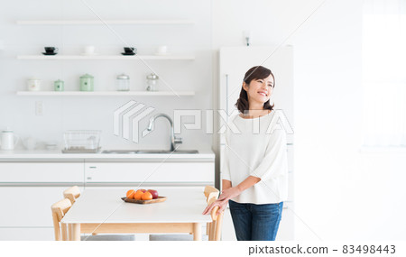 New house young woman New house young woman 83498443