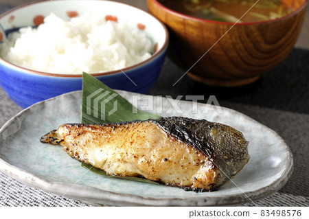 Saikyo-yaki of sablefish with grilled texture that looks delicious with fat, miso soup with trefoil, breakfast, set meal Saikyo-yaki of sablefish with grilled texture that looks delicious with fat, miso soup with trefoil, breakfast, set meal 83498576