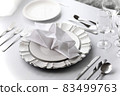 Western course meal table setting 83499763