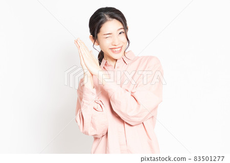Woman asking for hands together 83501277