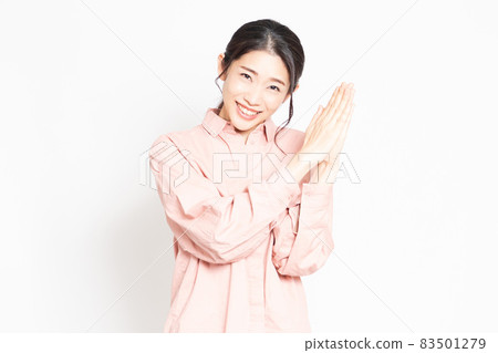 Woman asking for hands together 83501279