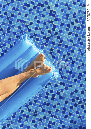 Relaxing in a pool 83507949