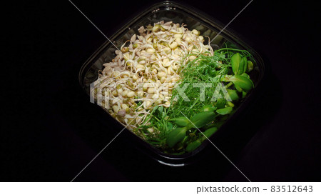 Photo of the plate with sprouted seeds of pea, bean, mung 83512643