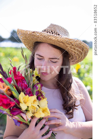 Young european woman in countryside Young european woman in countryside 83518652
