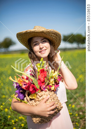 Young european woman in countryside Young european woman in countryside 83518653