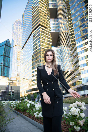 Young business woman in modern city 83519206