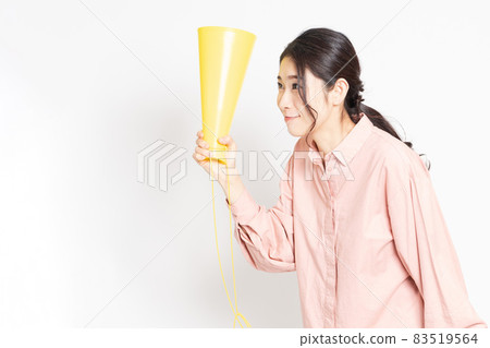 A woman making a cheering gesture A woman making a cheering gesture 83519564