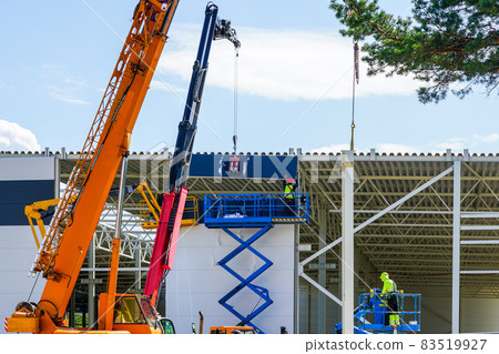 use of modern telescopic crane and scissor lifts in sandwich panel wall mounting use of modern telescopic crane and scissor lifts in sandwich panel wall mounting 83519927
