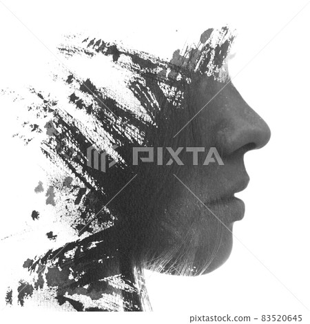 A black and white profile portrait of a woman combined with paint strokes. Paintography. 83520645