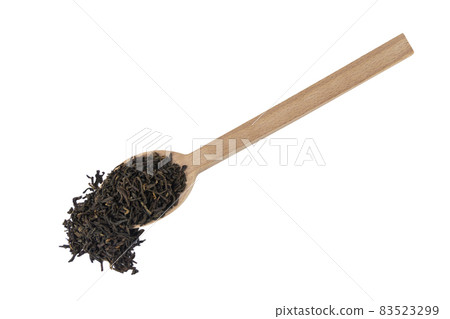 yunnan black tea on wooden spoon isolated on white background. 83523299