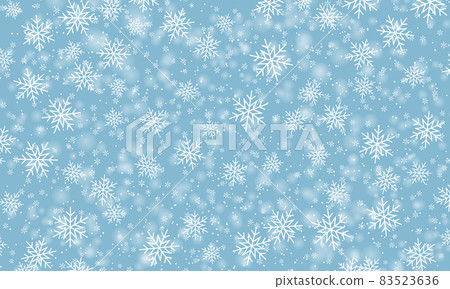 Snow background. Winter snowfall. White snowflakes on blue sky. Christmas background. 83523636