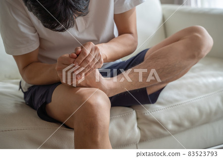 A man with a sore toe A man with a sore toe 83523793