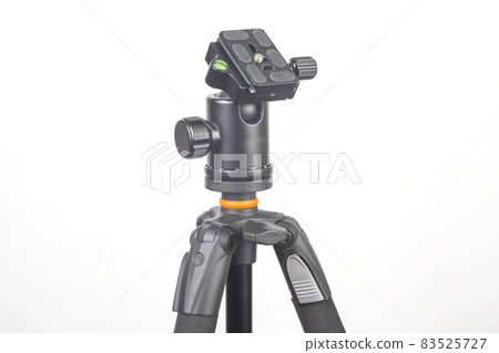 metal tripod for the camera. subjects for shooting a frame metal tripod for the camera. subjects for shooting a frame 83525727